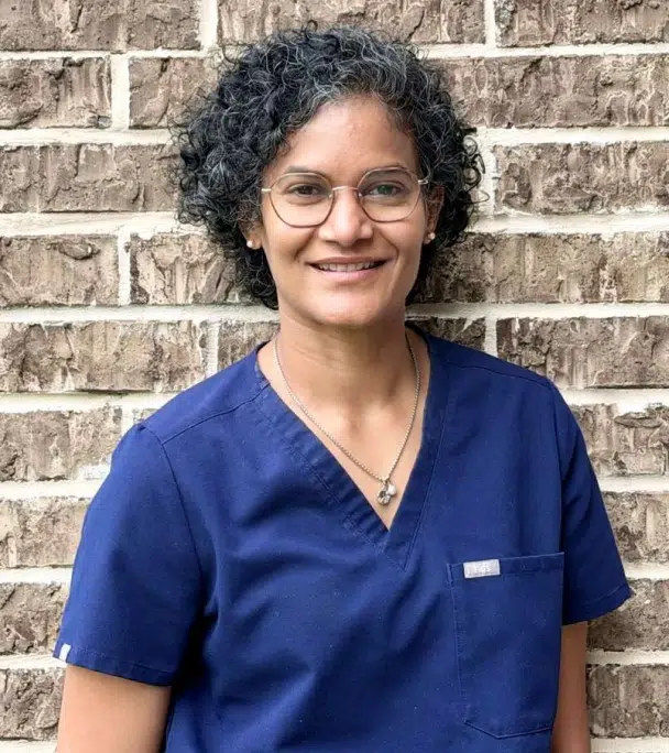 Professional portrait of Dr. Usha Kolli at Gentle Touch Dentistry Richardson